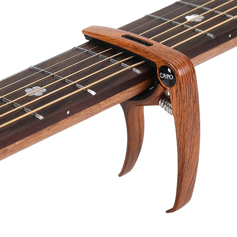 Capodastre pour guitare acoustique et électrique en metal ou bois - couleur bois