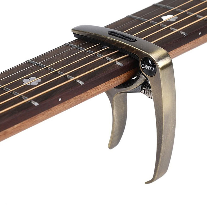 Capodastre pour guitare acoustique et électrique en metal ou bois - couleur metal
