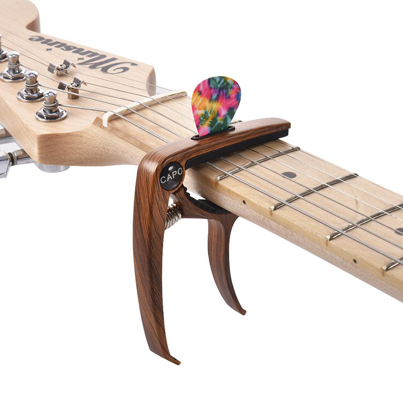 Capodastre pour guitares avec support pour médiators - modèle bois
