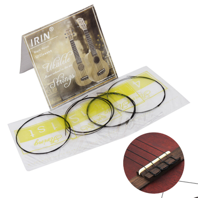 détails fixation Jeu de 4 cordes en nylon pour ukulélé