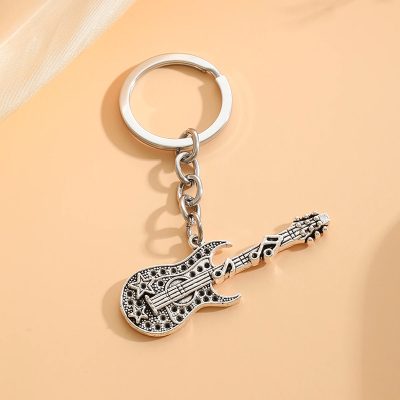 Modèle d'Amulette porte-clé guitare vintage