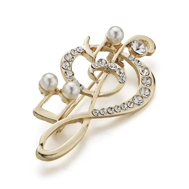 Vue complète de la Broche Clef de Sol ornée de Strass et de perles