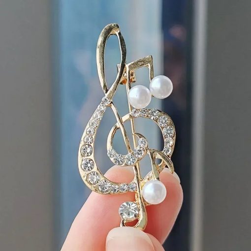 Broche Clef de Sol ornée de Strass et de perles