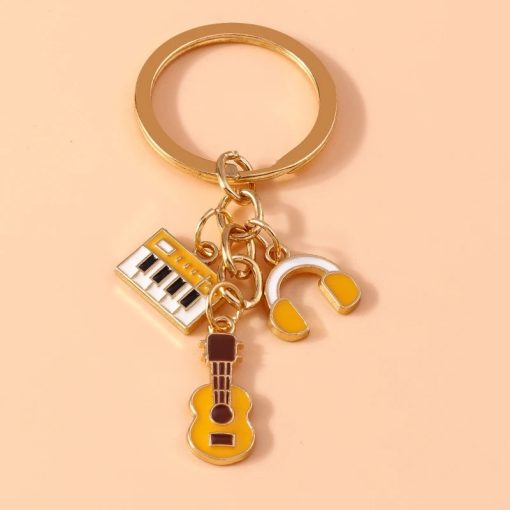 Porte-clés Guitare et instruments de Musique en métal couleur jaune