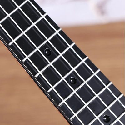 Détails des cordes du Ukulélé pour enfant instrument parfait pour les tout-petits