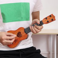 Détails des cordes du Ukulélé pour enfant instrument parfait pour les tout-petits