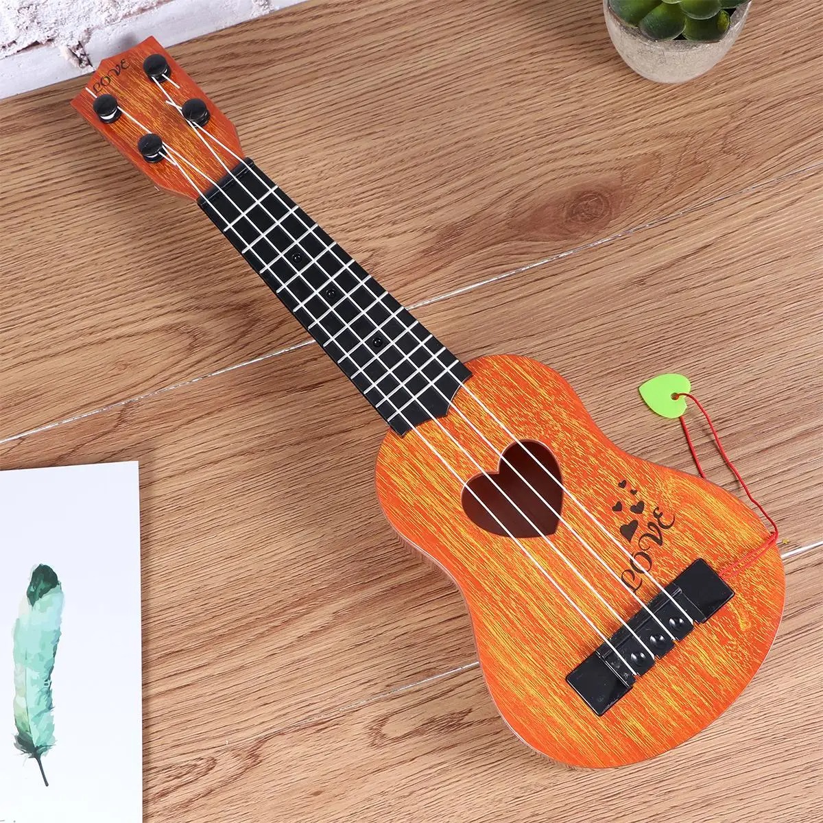 Détails des cordes du Ukulélé pour enfant instrument parfait pour les tout-petits