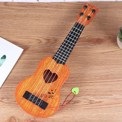 Détails des cordes du Ukulélé pour enfant instrument parfait pour les tout-petits