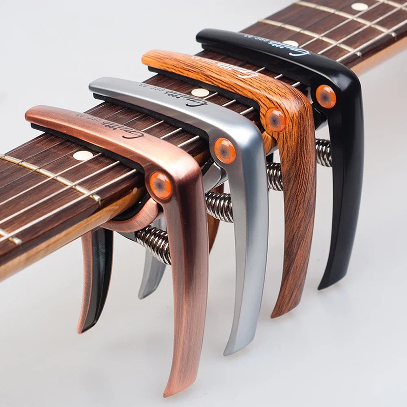 Capodastre Vintage Guitare à Ressort – 4 Couleurs au Choix