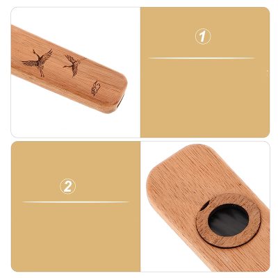 Details Kazoo en Bois Gravé à Motif Grues du Japon et Finition Artisanale