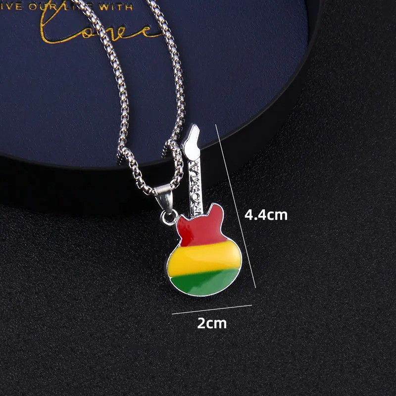 Dimension Pendentif Guitare Rock – Mini Rasta Vibes Dimension Pendentif Guitare Rock – Mini Rasta Vibes