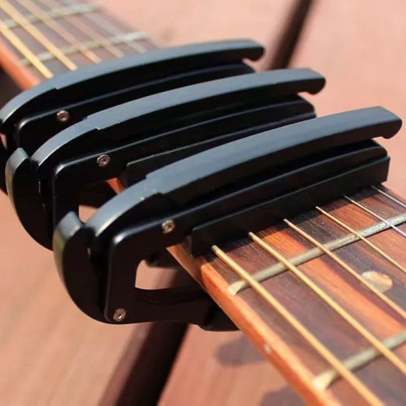 Magniffique Capodastre Guitare à Poignée Ergonomique - Serrage Rapide et Puissant