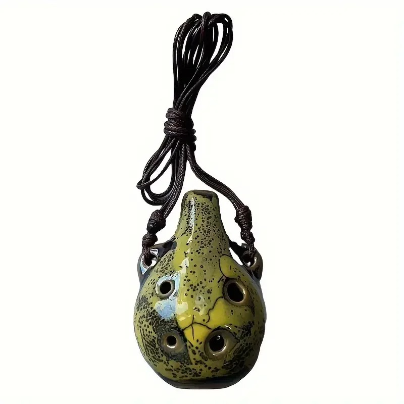 Vue détailléeOcarina en Céramique Miniature - Pendentif Musical 6 Trous couleur jaune