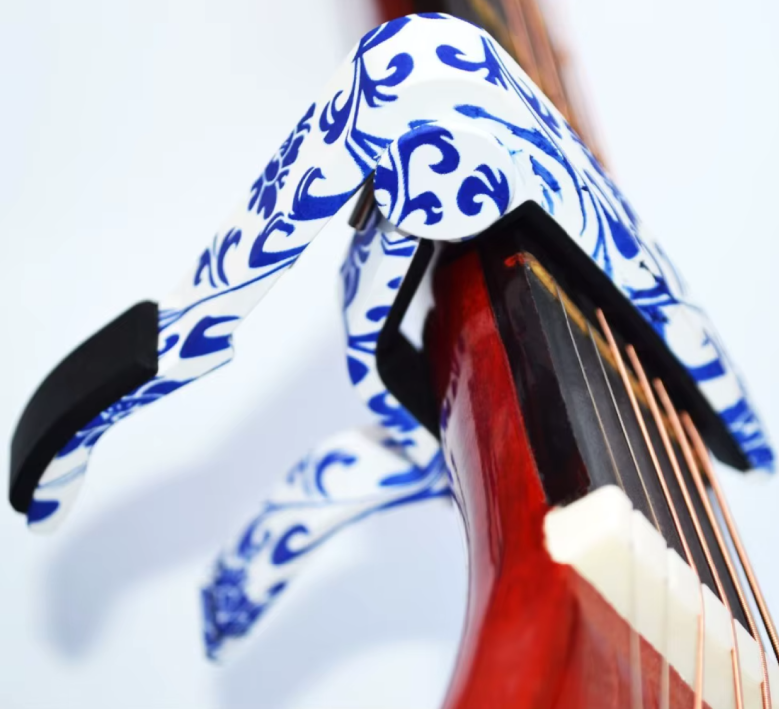 Détails du Capodastre Guitare Édition Porcelaine Bleue à Ressort Ergonomique