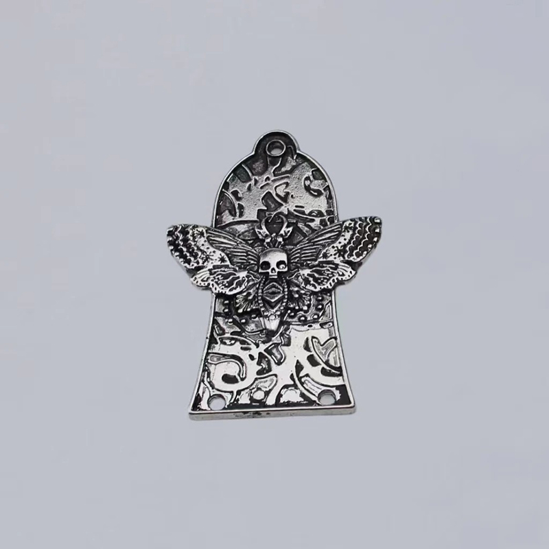 Avant Guide-Cordes Guitare - Papillon de la Mort Métallique Guyker Couleur Argent