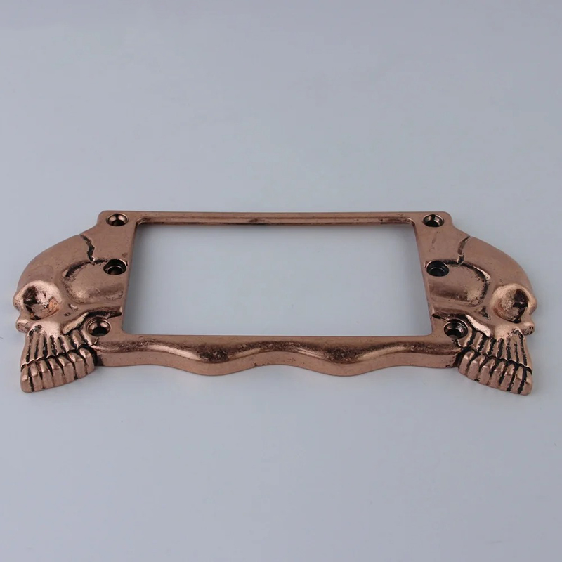Cadre de Micro Guitare Crâne Métallique Sculpté “Skull Frame” Couleur Or rose