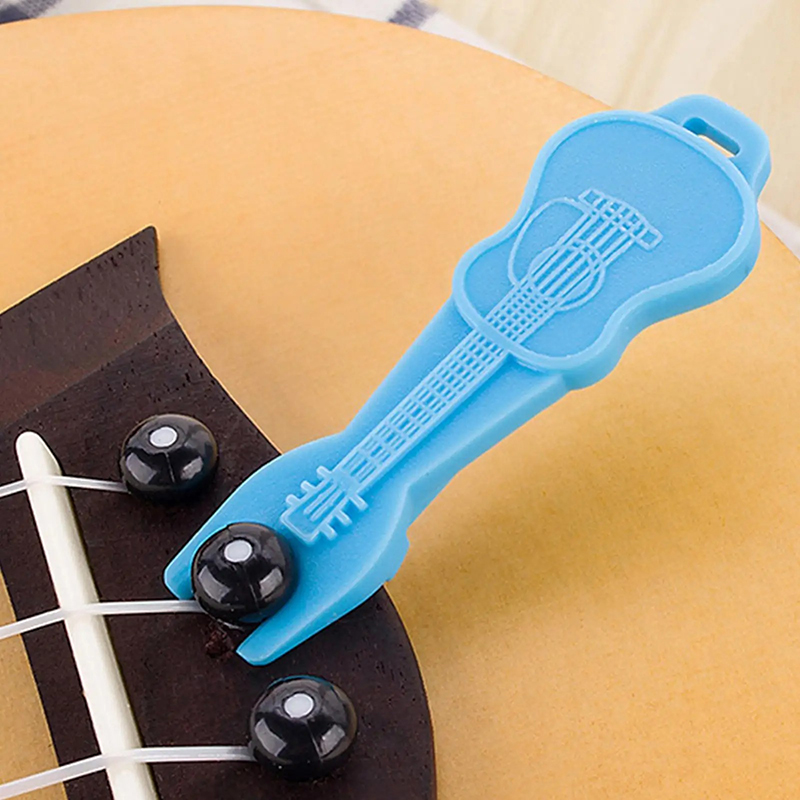 Extracteur de Chevilles pour - Guitare - Outil en Forme de Guitare