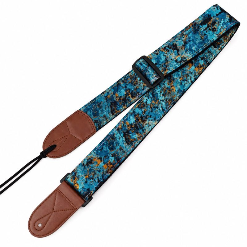 Sangle guitare jacquard Palette d'Artiste coloris Bleu Paon, bleu canard, noir et orangéSangle guitare jacquard Palette d'Artiste coloris Bleu Paon, bleu canard, noir et orangé