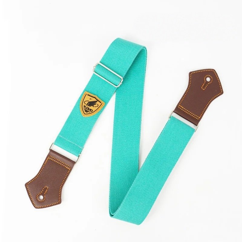 Sangle guitare unie Palette Pop coloris vert anis avec embouts en simili cuir brun