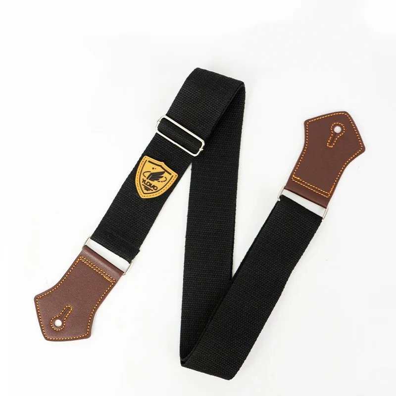 Sangle guitare unie Palette Pop coloris noir avec embouts en simili cuir brun