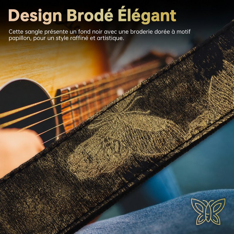 Sangle guitare jacquard Papillon d'Or noire et dorée sur fond blanc avec son lacet