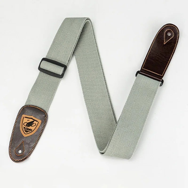 Sangle guitare en toile vert clair et embouts en cuir brun Heritage